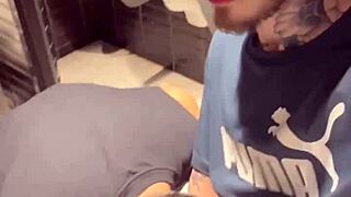 Gay men in bathrooms get handjobs.