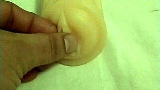 Anime girl fingers and assfucks artificial pussy in solo masturbation