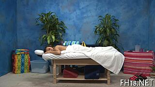 schlong massage in a relaxing session. the masseuse works on the client's body with care.