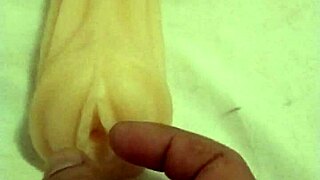 Anime girl fingers and assfucks artificial pussy in solo masturbation