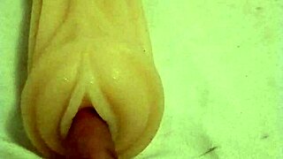 Anime girl fingers and assfucks artificial pussy in solo masturbation