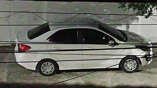 She meets her lover in the car in front of the house and returns smiling