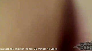 Blonde girl experiences double penetration on hotel sofa