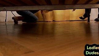 three babes dominate guy with butt plug and handjob