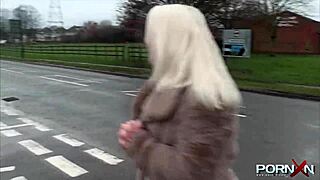 i, the petite blonde, can't hold it and piss publicly with my shaved pussy.