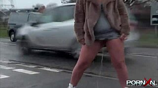 i, the petite blonde, can't hold it and piss publicly with my shaved pussy.