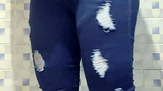 Hidden camera captures mature woman's emotional bathroom moment