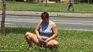 Redhead BBW Milf Caught Peeing in Public with Huge Boobs Exposed