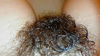 Hairy bush underwater in wild fetish close-up video.