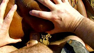 Black milf feels intense pleasure getting licked and fucked bent over on the beach