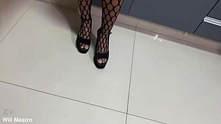 the hot babe in the kitchen with a big cock