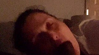 Beautiful mature milf licks and deepthroats big black cock in bedroom