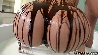Blonde with big ass plays with chocolate syrup