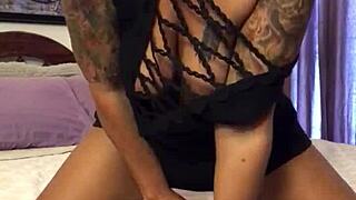 blonde tattooed milf seduces on cam with glass dildo until she squirts hard