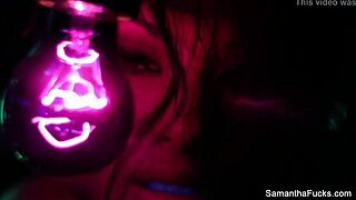 Samantha Saint enjoys lesbian sex under black light with big tits