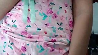 Model in sexy pink pajamas with innocent colleague