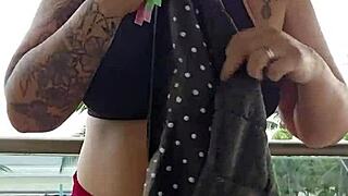 girl flashes her ass on the balcony in skirt