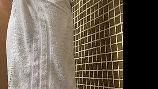 Brazilian spy in the gym shower sees a huge dick.