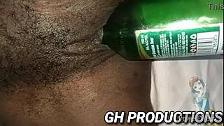 ebony babe spreads for club bottle insertion in pussy and ass