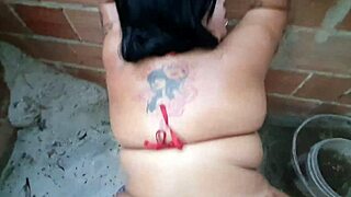 shemale self-masturbates with a marker in solo scene