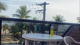 Husband Catches Wife Flashing On Balcony In Bikini.