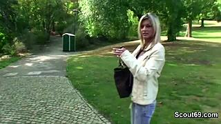 two boys talk to stranger girl in park