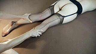 a horny milf gets a soles massage while wearing stockings, with tickling and moaning