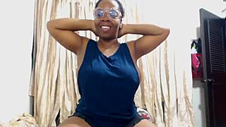 ebony mom shows off her flexible big tits and muscular body