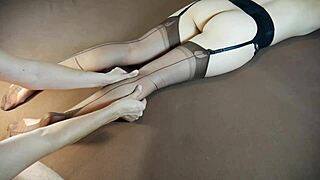 a horny milf gets a soles massage while wearing stockings, with tickling and moaning