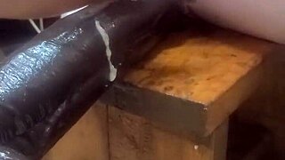 experimenting with huge dildos on the machine at home