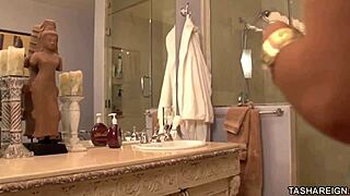 Tasha Reign teases with glass dildo in wet slit