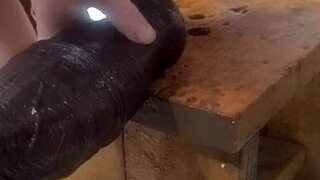 experimenting with huge dildos on the machine at home