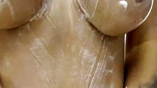 Monika Fox strips naked at home, rubbing cream on her body. Does she tease with pierced nipples for free?