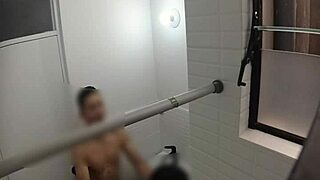 Hidden cam spies on cute teen in public bathroom.