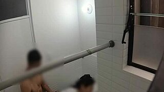 Hidden cam spies on cute teen in public bathroom.