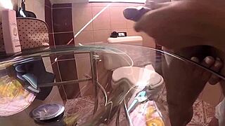 Milf gives handjob from behind in bathroom