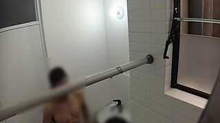 Hidden cam spies on cute teen in public bathroom.