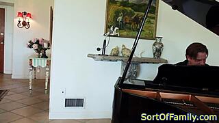 Black stepdaughter bent over for doggystyle by mature man near piano.