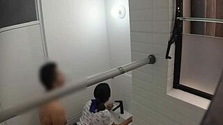 Hidden cam spies on cute teen in public bathroom.