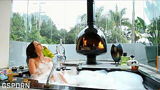 Beautiful brunette milf with big tits masturbates her wet pussy in the bathroom