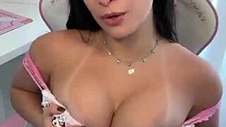 Emanuelly Raquel hot Latina dirty talks while applying oil on her big boobs.