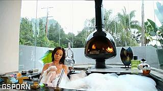 Beautiful brunette milf with big tits masturbates her wet pussy in the bathroom