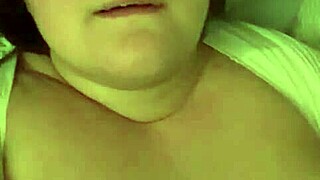 Moaning face caught in intense close-up moment