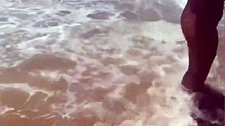 african beauty flashes boldly at the public beach today