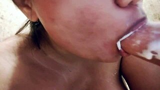 Messy fun sucking a huge milk-filled dildo up close!