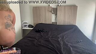 i was alone at home and shoved my friend's cock into my homemade anal pussy, feeling my big tanned tits bounce with piercing and tan lines in the bedroom.