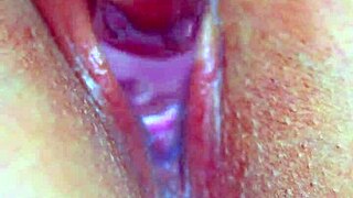 Girl's puffy pussy loves that glass dildo