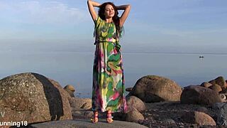 Norma A Enjoys Sensual Solo Play on Baltic Beach. Her Shaved Body Glows Under Evening Sky.