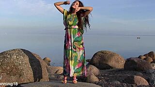 Norma A Enjoys Sensual Solo Play on Baltic Beach. Her Shaved Body Glows Under Evening Sky.