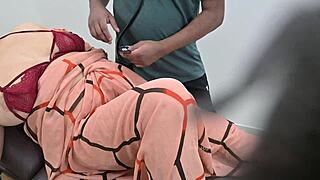 Indian Doctor Checking Lady Patient In Clinic